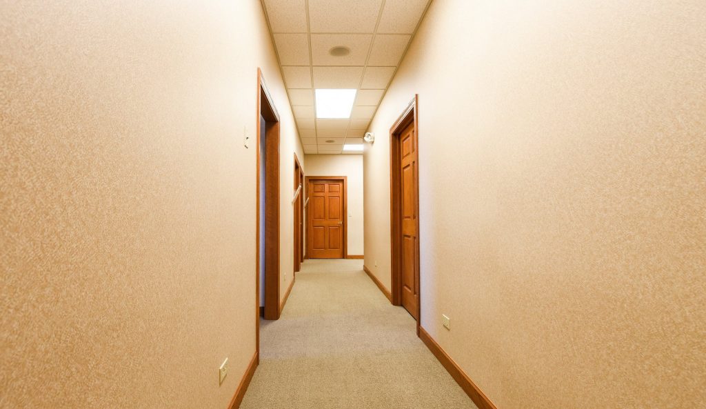 Soundproof and easy navigational dental office corridor Kalant OMS